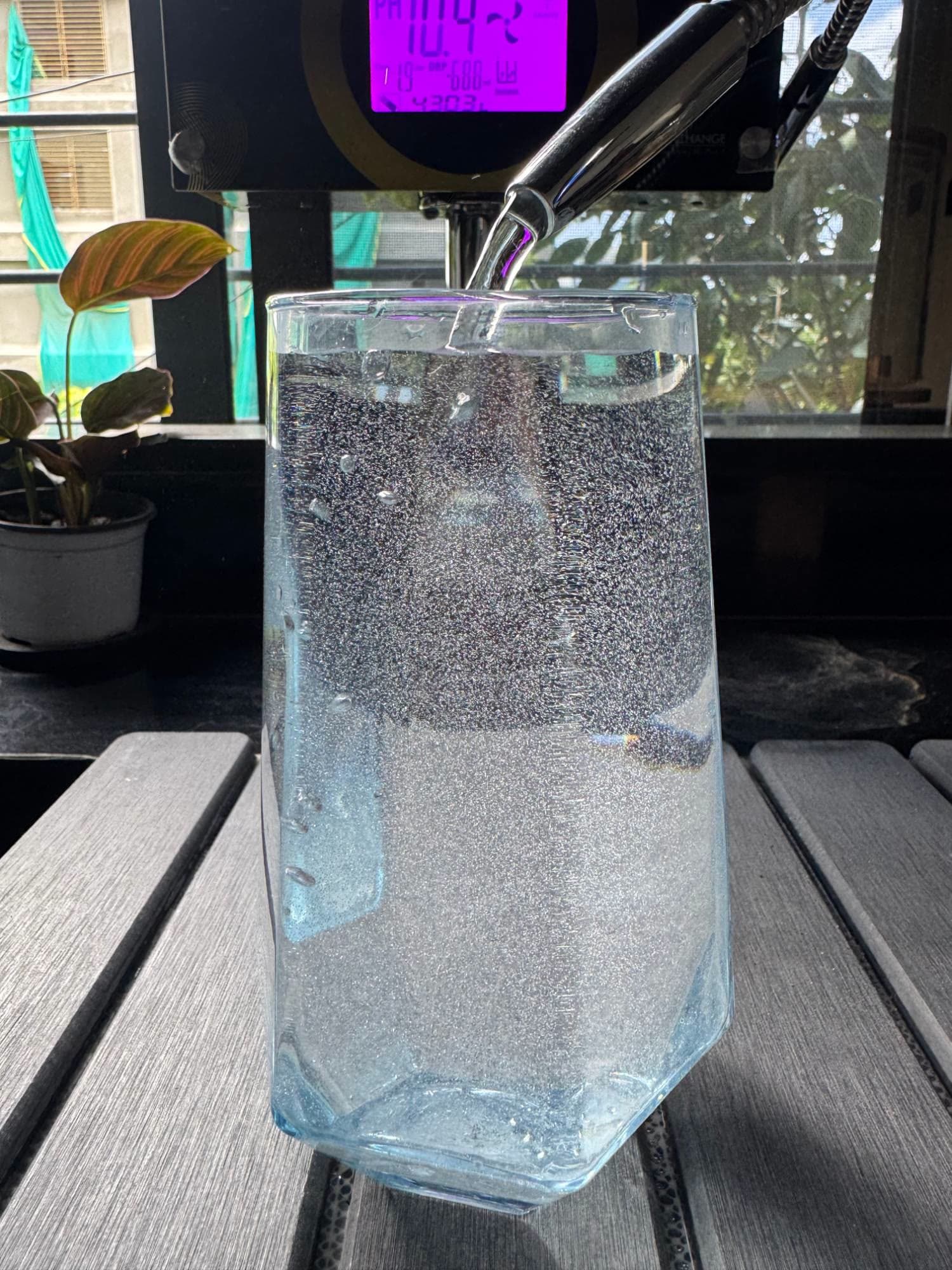 Hydrogen water being poured into a glass at the studio